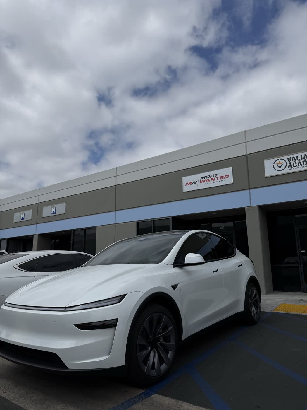 Customer Tesla with ceramic window tint at the Most Wanted studio
